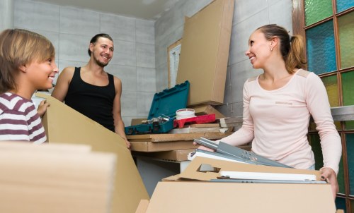 Removal team helping with a house move in Woodford