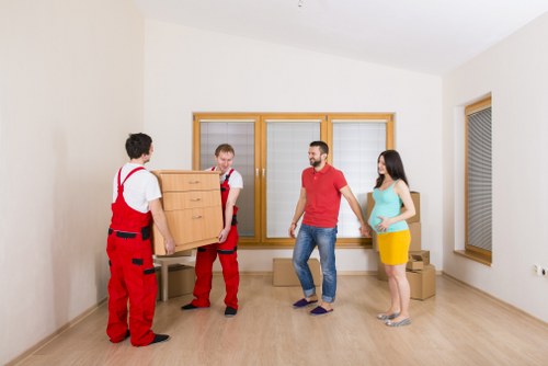 Fragile items carefully wrapped by packing services Woodford