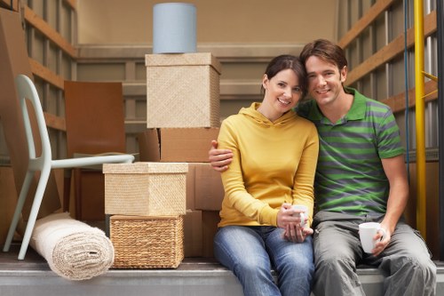 Professional removals team preparing a home move in Woodford