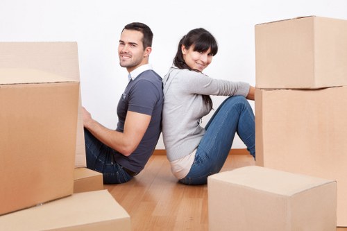 Professional mover navigating a residential street in Woodford